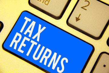 Text sign showing Tax Returns. Conceptual photo Tax payer financial information Tax Liability and Payment report Keyboard blue key Intention create computer computing reflection document