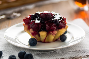cake with berries on a plate
