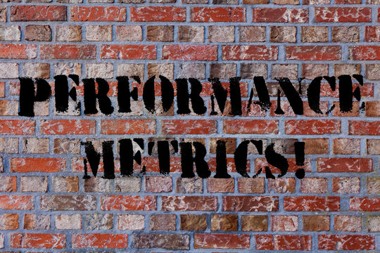 Text sign showing Perforanalysisce Metrics. Business photo text used measuring and tracking perforanalysisce production Brick Wall art like Graffiti motivational call written on the wall - Powered by Adobe