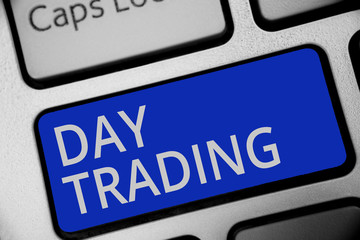 Handwriting text writing Day Trading. Concept meaning securities specifically buying and selling financial instruments Keyboard blue key Intention create computer computing reflection document