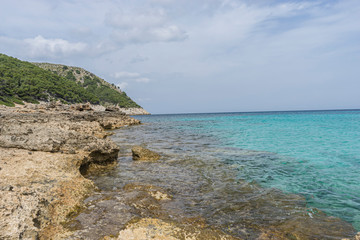 turquoise Mediterranean sea waters on the beaches of the island of Mallorca, Balearic Islands, Spain