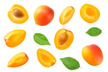 apricot fruits with slices and green leaf isolated on white background. top view