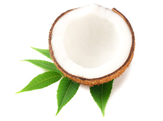 half of coconut with green leaves isolated on white background