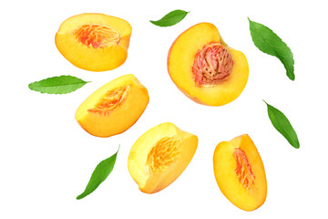 peach fruit slices with green leaves isolated on white background. top view