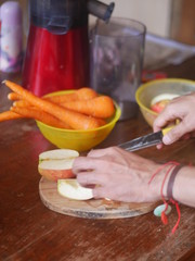 Preparing juice apple carrot
