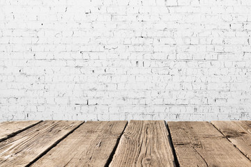 Vintage room interior. Old white brick wall and wooden floor background texture. Space for your background placement or products. Mockup image