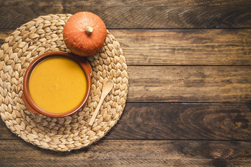 Flat lay arrangement with pumpkin and soup