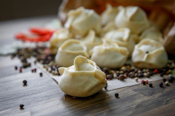 Homemade meat dumplings - russian pelmeni.
