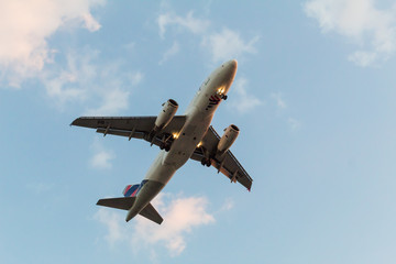Fototapeta na wymiar Aircraft approaching to land in Congonhas Airport (CGH) in Sao Paulo, Brazil