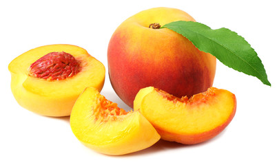peach fruit with green leaves and slices isolated on white background