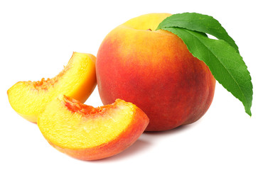 peach fruit with green leaves and slices isolated on white background