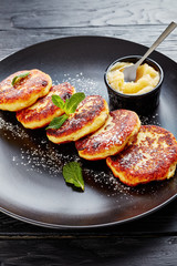 german quark Potato pancakes on a black plate