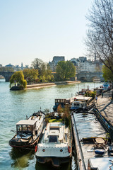 Fototapeta na wymiar PARIS, FRANCE - MARCH 31, 2019: Street view of river Seine in Paris city, France.
