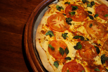 Top view of marguerita pizza. pizza marguerita on the table.