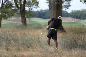 golf tournament shot from weeds