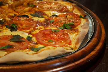 Top view of marguerita pizza. pizza marguerita on the table.