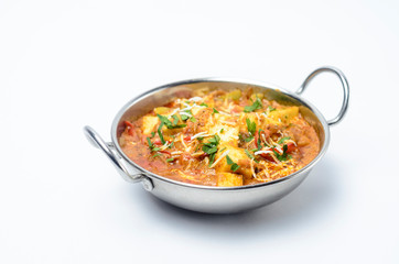 Kadai Paneer / Typical Indian Cheese cooked with vegetables in a spicy hot curry sauce in a Kadai...