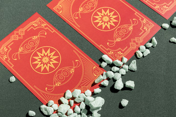 Close up red tarot cards on table