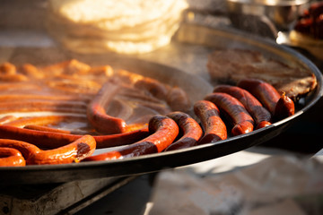 Grilled sausages. Balkan grill. Street food. Food festival