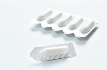 corticosteroid cream for hemorrhoid therapy used by insert in bottom hole packing on white background