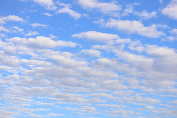 Beautiful blue sky with clouds background.