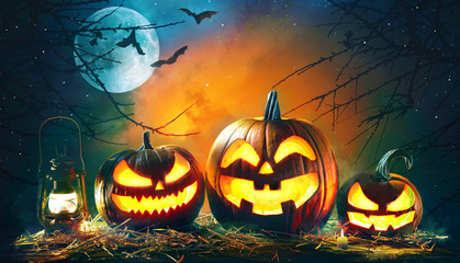 Halloween pumpkin head jack lantern with burning candles