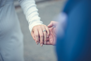 Hands with wedding ring