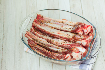 Fresh pork ribs marinated in spices. Delicious and hearty dinner.