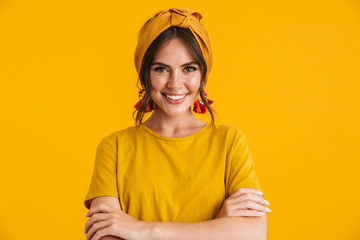 Portrait of a pretty young girl casualy dressed standing isolated