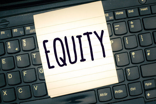 Writing note showing Equity. Business photo showcasing quality of being fair and impartial race free One hand Unity.