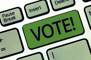 Handwriting text writing Vote. Concept meaning formal indication choice between two or more...