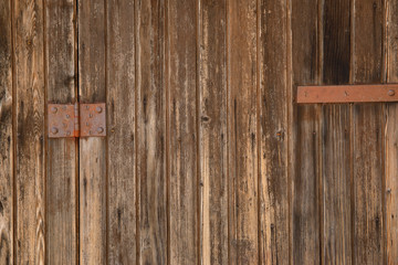 Obraz na płótnie Canvas Brown wooden doors texture background.