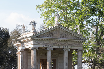 Obraz premium Fragment of facade of Aesculapius Temple in the Villa Borghese Gardens , Pincian Hill, Rome, Italy.