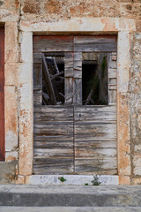 Wooden doors in a destructed building