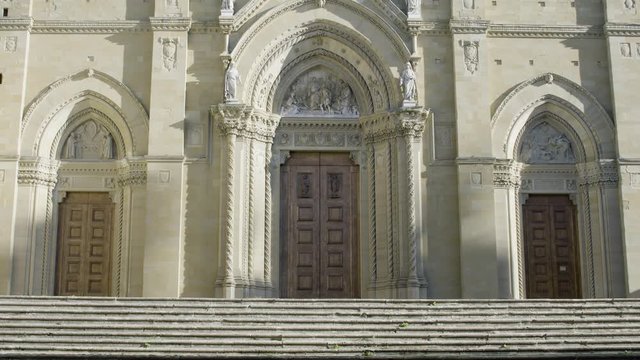 Front of the Duomo di Arezzo with three doors, italy, tuscany
