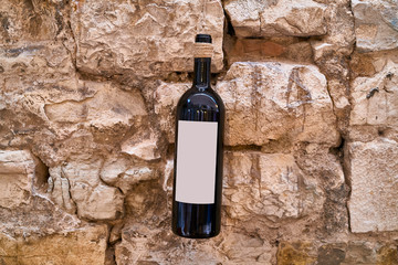 Red wine bottle on the wall