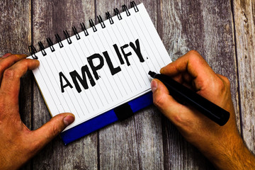 Writing note showing Amplify. Business photo showcasing Make something bigger louder increase the...