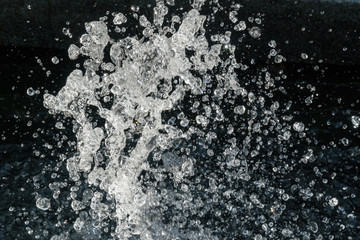 Water Splash on black background.Stylish water splash. Isolated on black background.