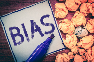 Writing note showing Bias. Business photo showcasing Prejudice in favor of and against one thing...