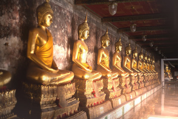 Ancient golden buddha state at Wat Suthat ,Bangkok ,Thailand