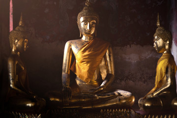Ancient buddha at Wat Suthat ,Bangkok ,Thailand