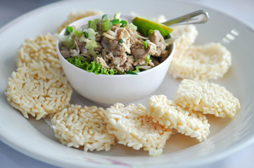 crispy rice,crispy rice cake or rice crackers with spicy tuna salad