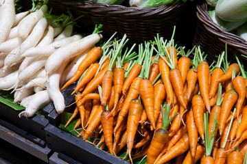 Fresh organic carrots. Fresh garden carrots. Bunch of fresh organic carrots at market.