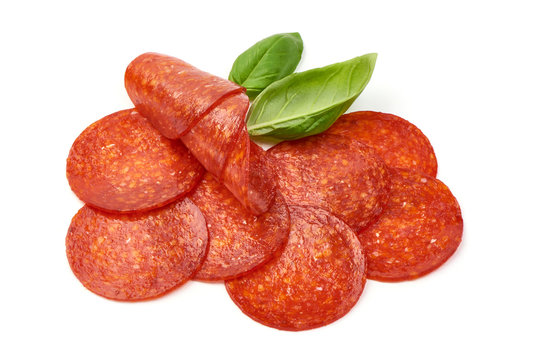 Chorizo sausage slices, Traditional spanish sausage, isolated on white background