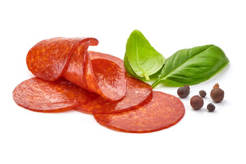 Chorizo sausage slices, Traditional spanish sausage, isolated on white background