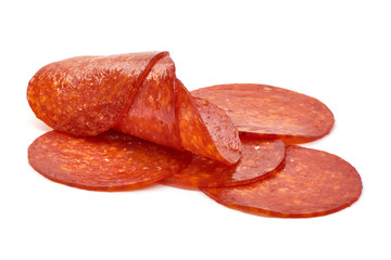 Chorizo sausage slices, Traditional spanish sausage, isolated on white background