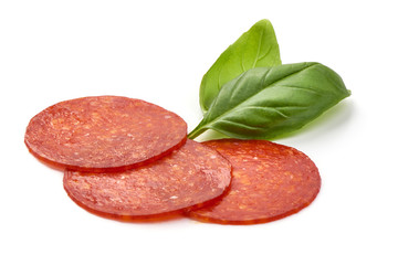 Chorizo sausage slices, Traditional spanish sausage, isolated on white background