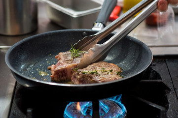 Frying Steak on Pan, Steak in the pan in the Kitchen