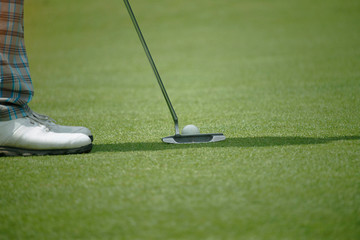 Golfers are playing golf in the evening golf course in thailand