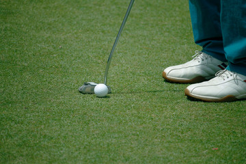 Golfers are playing golf in the evening golf course in thailand